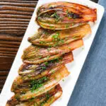 Overhead Braised White Chicory or Belgian Endive with Snipped Chives.