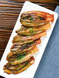 Overhead Braised White Chicory or Belgian Endive with Snipped Chives.