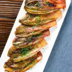 Overhead Braised White Chicory or Belgian Endive with Snipped Chives.