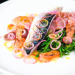 Salt cured mackerel fillet salad with grapefruit, samphire and toasted rye bread.