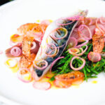 Salt cured mackerel fillet salad with grapefruit, samphire and toasted rye bread.