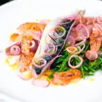 Salt cured mackerel fillet salad with grapefruit, samphire and toasted rye bread.