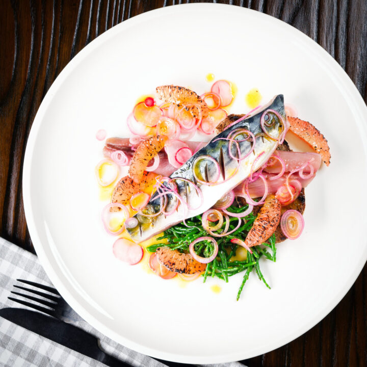 Salt cured mackerel salad with samphire, grapefruit, radish, shallot and rye bread.