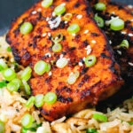 Close-up honey and miso glazed tofu served with egg fried rice.