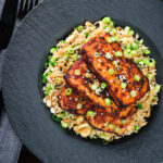 Overhead honey and miso glazed tofu served with egg fried rice.