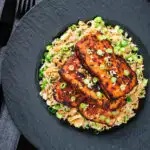 Overhead honey and miso glazed tofu served with egg fried rice.