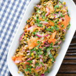 Overhead mung bean salad with Indian flavours & pickled carrot and red onion.