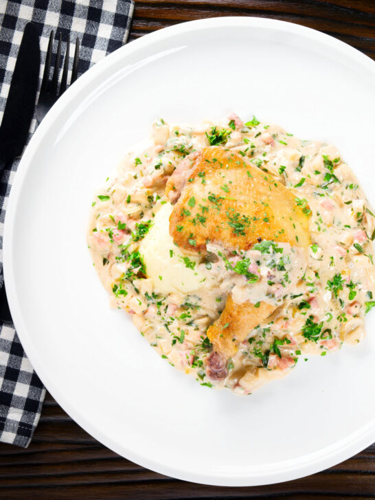 Overhead chicken Normandy in a cider and mustard sauce served with creamy mashed potatoes.