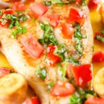 Close-up pan fried brill fish served with sauce vierge and fried potatoes.
