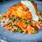 Tandoori cod fish with raita and a mung bean salad.