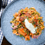 Overhead tandoori cod fish with raita and a mung bean salad.