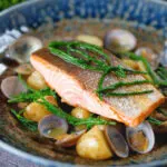 Pan fried sea trout fillet with clams, new potatoes and fresh samphire.