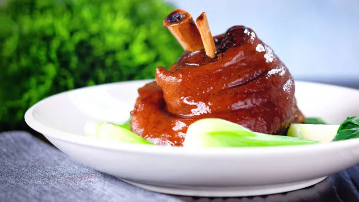 Chinese-influenced braised pork knuckle or shank in black bean sauce.