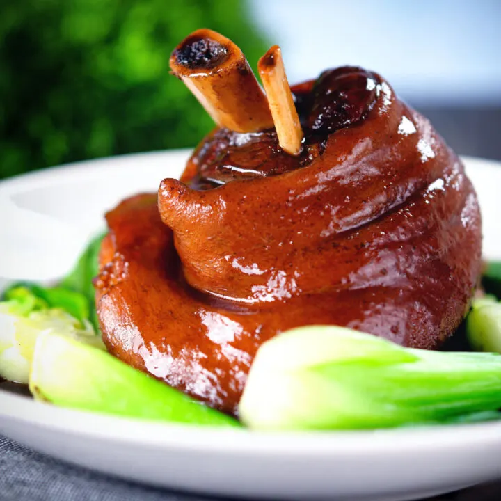 Chinese-influenced braised pork knuckle or shank in black bean sauce.