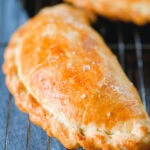 Homemade corned beef, onion and potato pasty made with shortcrust pastry.