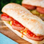 Spam, scrambled egg and spring onion sandwich with sweet chilli sauce.