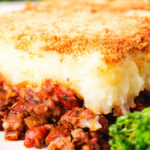 Close-up French Hachis Parmentier with a mashed potato & breadcrumb topping.