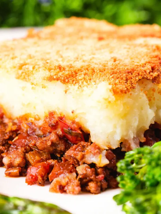 Close-up French Hachis Parmentier with a mashed potato & breadcrumb topping.