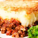 Close-up French Hachis Parmentier with a mashed potato & breadcrumb topping.