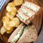 Overhead boiled egg and cress sandwiches with mayonnaise on wholemeal seeded bread.