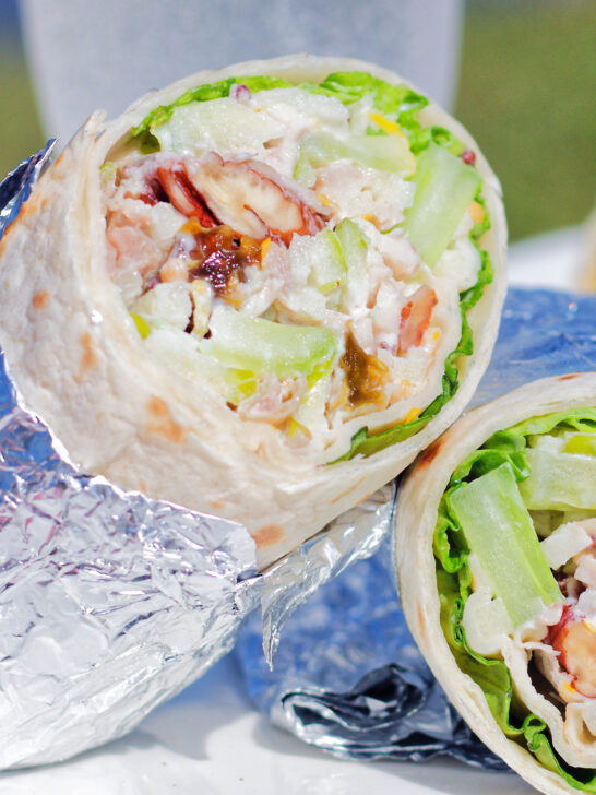Chicken Waldorf salad wraps in flour tortillas.