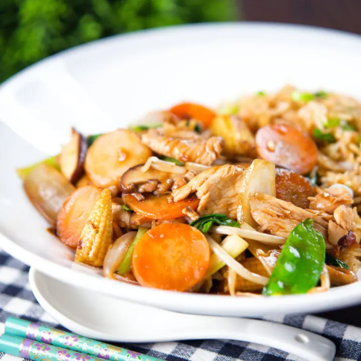 Chinese-takeaway-influenced chicken chop suey stir fry served with egg fried rice.