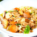 Homemade Chinese chicken chop suey fakeaway served with egg fried rice.