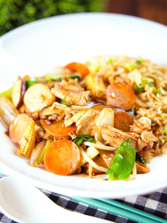 Homemade Chinese chicken chop suey fakeaway served with egg fried rice.