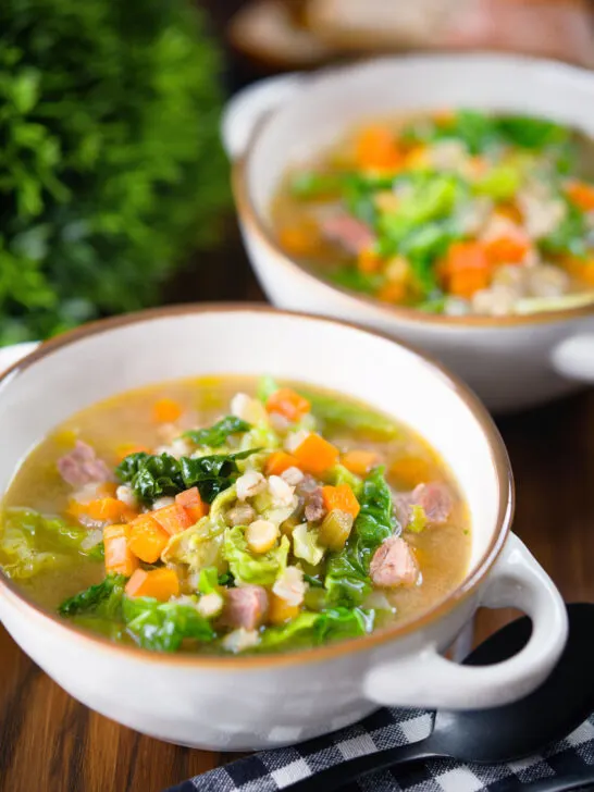 Traditional Scotch broth soup with lamb, pearl barley and savoy cabbage.