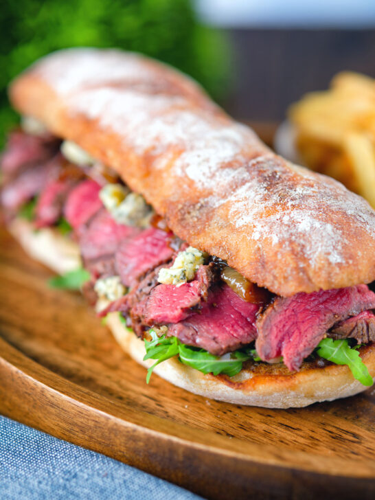 Steak, stilton and caramelised onion sandwich served on ciabatta with french fries.