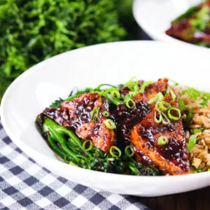 Fried tofu in black bean sauce with tenderstem broccoli and egg fried rice.