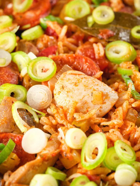Close-up one-pot Cajun-influenced chicken and chorizo jambalaya.