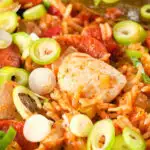 Close-up one-pot Cajun-influenced chicken and chorizo jambalaya.