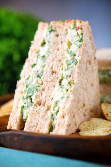 Canned crab sandwich with coriander, lime and chilli mayonnaise on seeded bread.