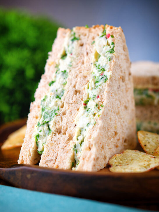 Canned crab sandwich with coriander, lime and chilli mayonnaise on seeded bread.