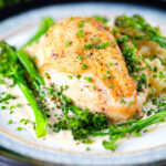 Creamy tarragon chicken breasts served with celeriac mash and tenderstem broccoli.