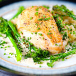 Creamy tarragon chicken breasts served with celeriac mash and tenderstem broccoli.