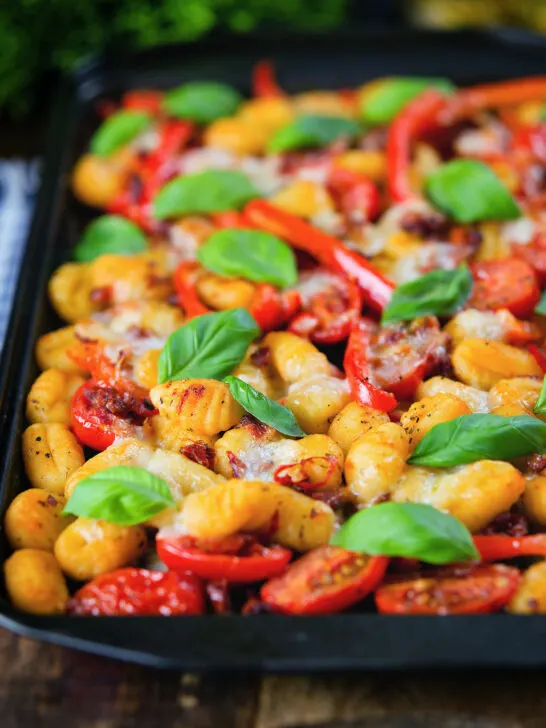Gnocchi tray bake with sun-dried and fresh tomatoes, mozzarella and pickled chilli.