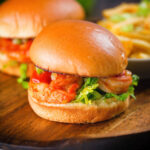 King prawn sandwich with a bloody Mary sauce and celery on a brioche bun.