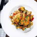 Overhead air fryer halloumi cheese with a hot honey glaze served with Lebanese inspired batata harra.