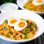 British-Indian smoked mackerel kedgeree topped with a perfect boiled egg.