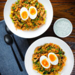 Overhead British-Indian smoked mackerel kedgeree (rice) served with boiled egg.