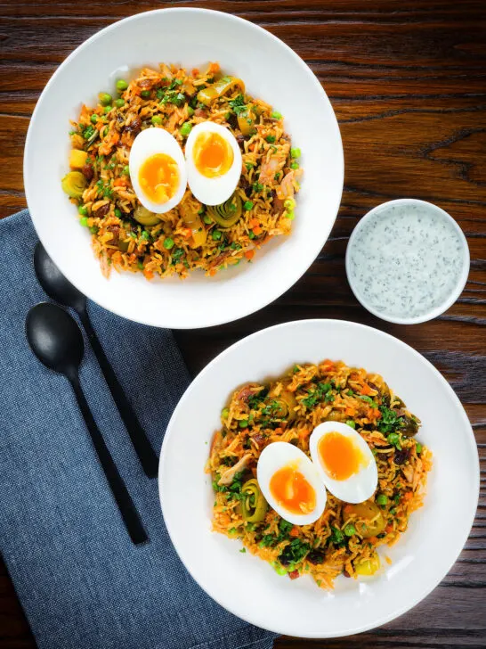 Overhead British-Indian smoked mackerel kedgeree (rice) served with boiled egg.