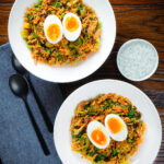 Overhead British-Indian smoked mackerel kedgeree (rice) served with boiled egg.