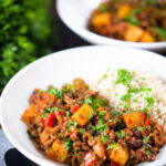 Cuban minced beef picadillo with potatoes, raisin, capers and brown rice.