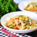 Filipino chicken pancit bihon (guisado) with rice noodles and loads of vegetables.