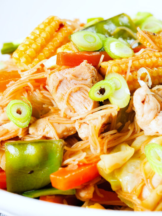 Close-up Filipino chicken and vegetable pancit bihon (rice noodles) aka guisado.