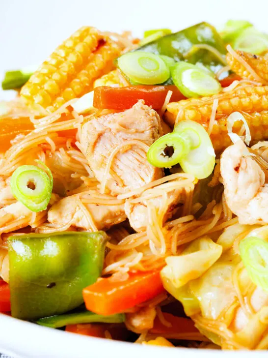 Close-up Filipino chicken and vegetable pancit bihon (rice noodles) aka guisado.