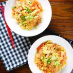 Overhead Filipino chicken and vegetable pancit bihon (rice noodles) aka guisado.