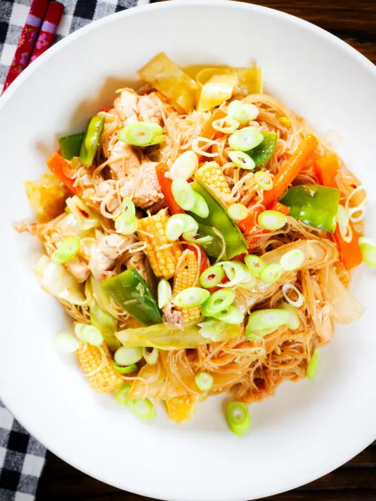 Close-up overhead Filipino chicken and vegetable pancit bihon (rice noodles) aka guisado.